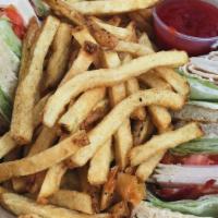Chicken Club Sandwich · Smoked fresh sliced chicken breast, crispy bacon, Swiss cheese, lettuce, tomato, and mayonna...