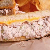 Tuna Melt · Tried and true, served on grilled sourdough along with melted American and Swiss cheeses.