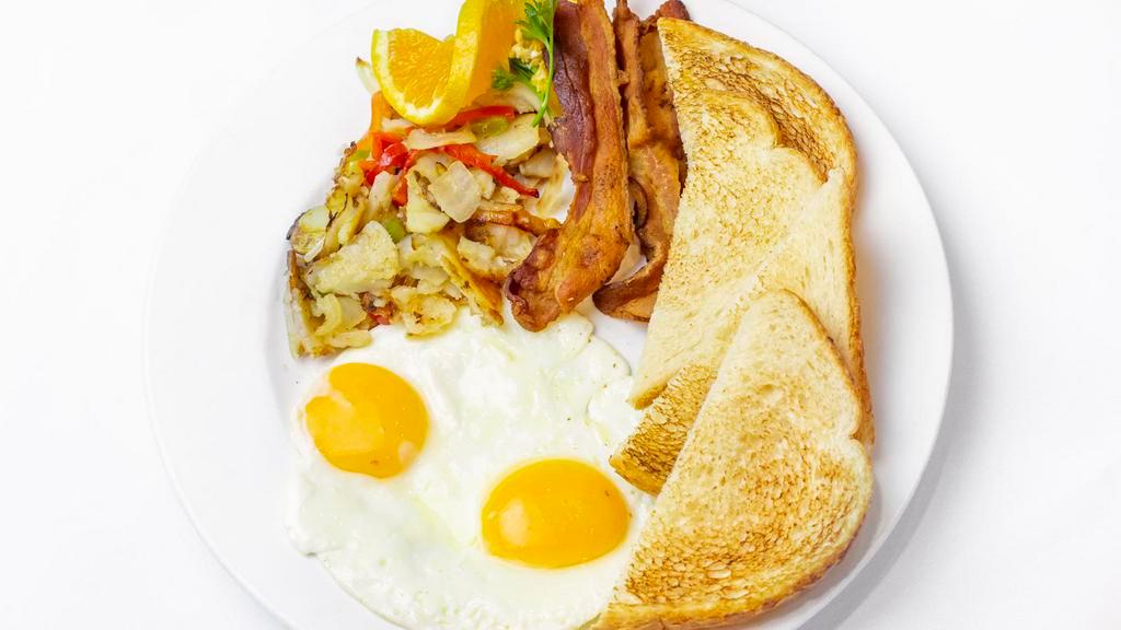 Two Egg Breakfast With Bacon · Two jumbo farm fresh eggs any style served with thick-cut bacon, RubySpuds, and your choice of toast or English muffin.