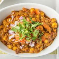 Chana Masala · Garbanzo beans cooked with tomatoes and onions.