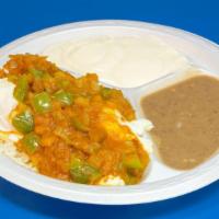 Huevos Rancheros Breakfast · Over medium eggs topped with tomato sauce, onion and bell pepper. Includes rice, beans, crea...