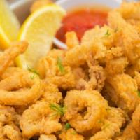 Fried Calamari · Hand tossed calamari in our homemade batter and fried to perfection.