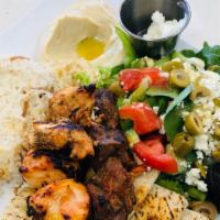Chicken And Beef Kabob Plate · Grilled Chicken & Beef Kabob with a side of Rice, Hummus, Greek Salad & Pita Bread