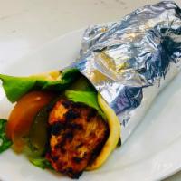 Chicken Kabob · Grilled Chicken inside of Pita Bread with Tomato, Pickles, Spring Mix, and Our Signature Gar...