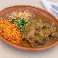 Chile Verde Plate · Chunks of pork shoulder slow cooked in a roasted tomatillo and jalapeno chile verde sauce.