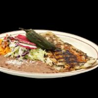 Fish Filet · Delicious grilled fish filet with rice and beans.