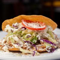 Tostadas · Choice of meat prepared on a deep fried corn tortilla