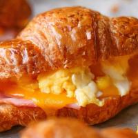 Croissant Sandwich · Scrambled egg, ham and melted cheese.