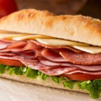 Downtown Club · Turkey, ham, salami, Swiss cheese with lettuce, tomato, onion, pickle, mayonnaise, mustard s...