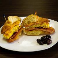 Bacon Breakfast Croissant  · Bacon with two eggs & cheese on buttered sourdough toast.