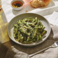 Penne Pesto · Penne pasta tossed in a basil pesto sauce with parmesan cheese.