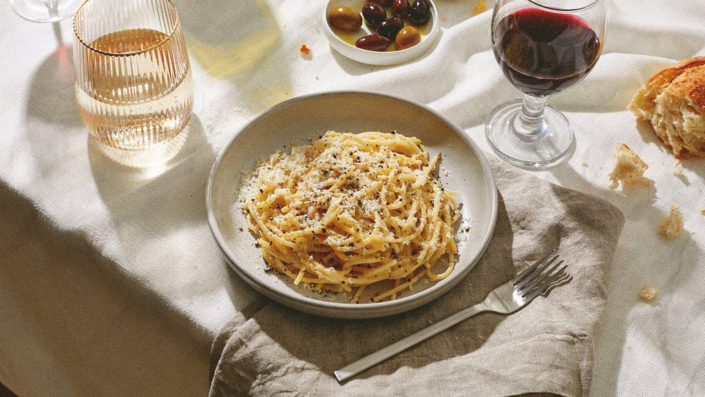 Cacio E Pepe · Spaghetti in a rich sauce made of Parmesan cheese and black pepper.