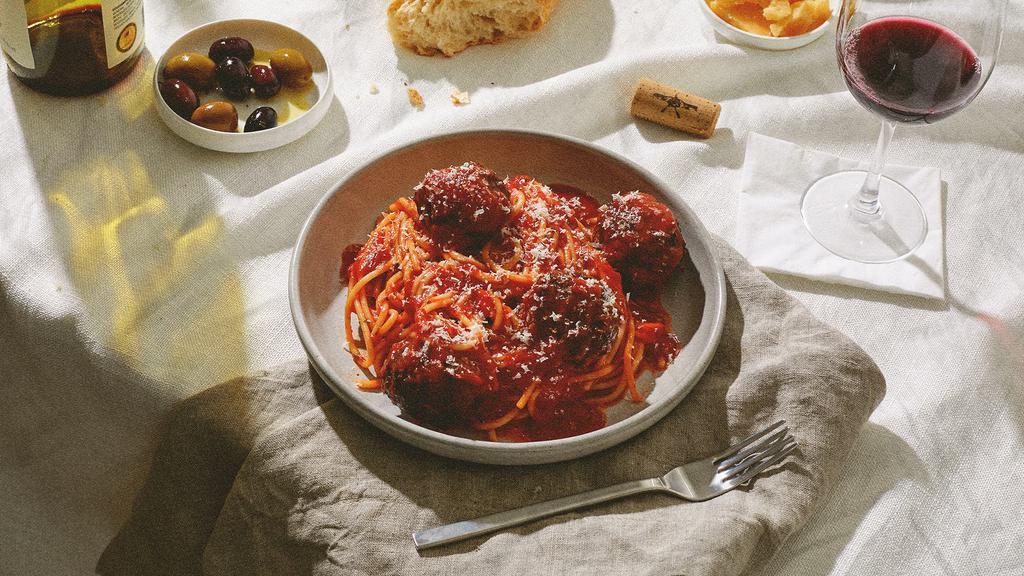 Spaghetti And Meatballs · Classic spaghetti with meatballs and marinara sauce, and topped with fresh Parmesan cheese.