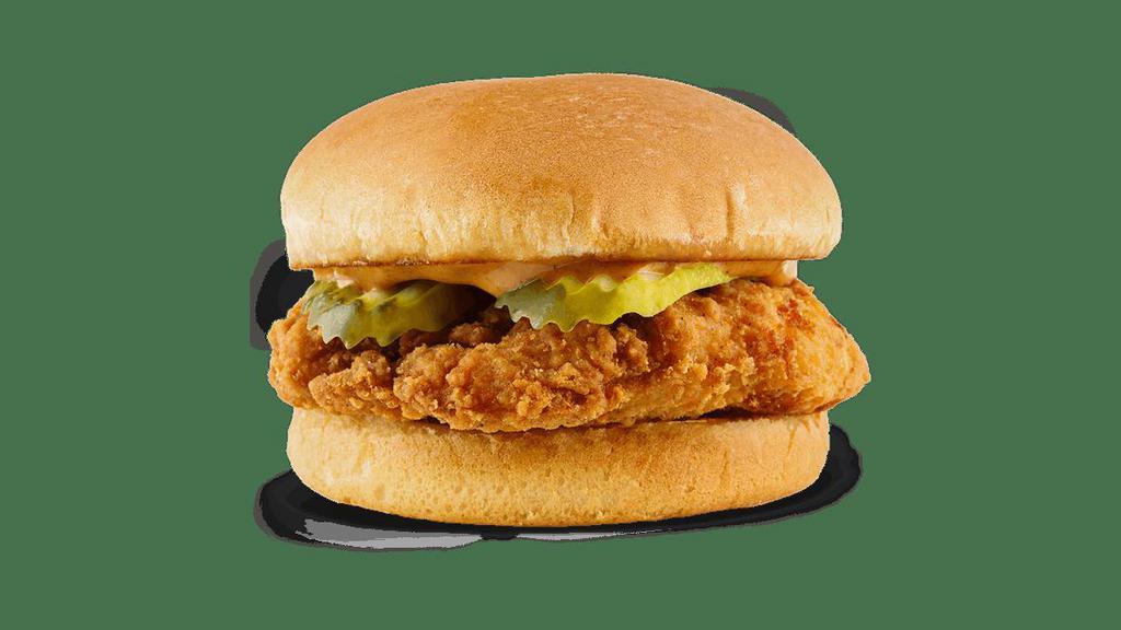 Spicy Chicken Sandwich · A tender chicken breast fillet topped with extra spicy Jalapeño Fry Sauce and crunchy pickles on a toasted bun.