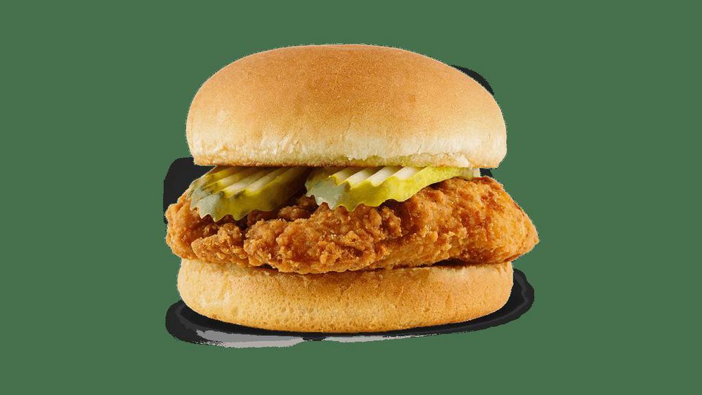 Crispy Chicken Sandwich · A tender chicken breast fillet cooked to a crispy golden brown and topped with crunchy pickles, all on a perfectly toasted bun.