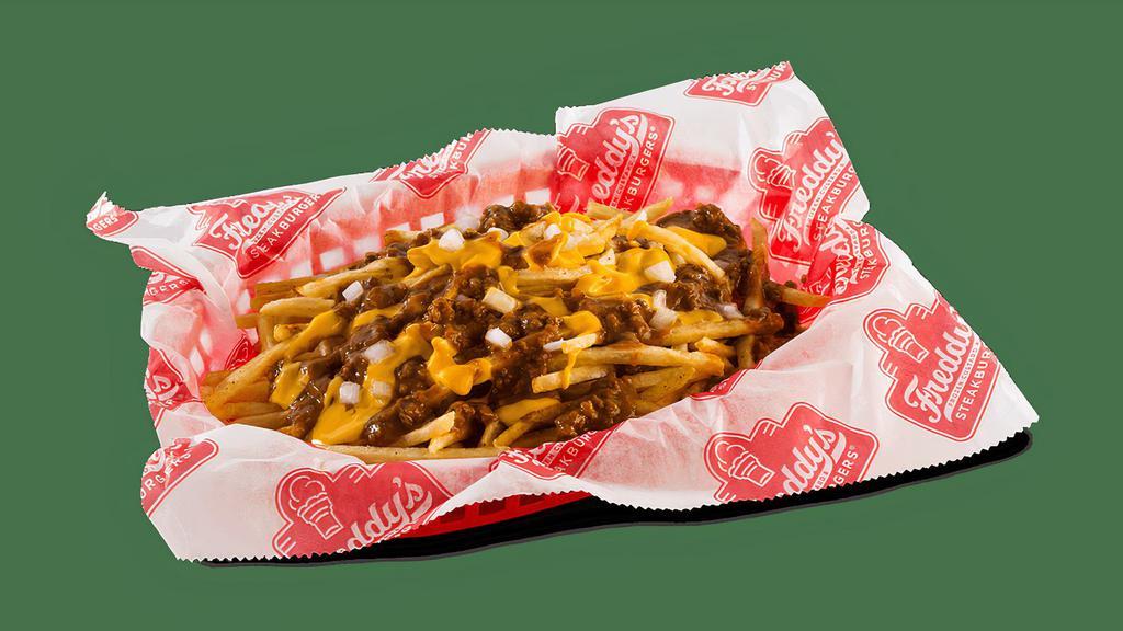 Chili Cheese Fries · Freddy's Shoestring Fries topped with chili, jalapeño cheese sauce & diced onions.