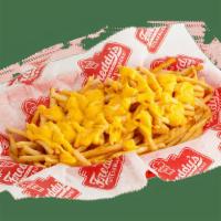 Cheese Fries · Freddy's Shoestring Fries topped with jalapeño cheese sauce.