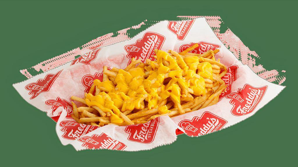 Cheese Fries · Freddy's Shoestring Fries topped with jalapeño cheese sauce.