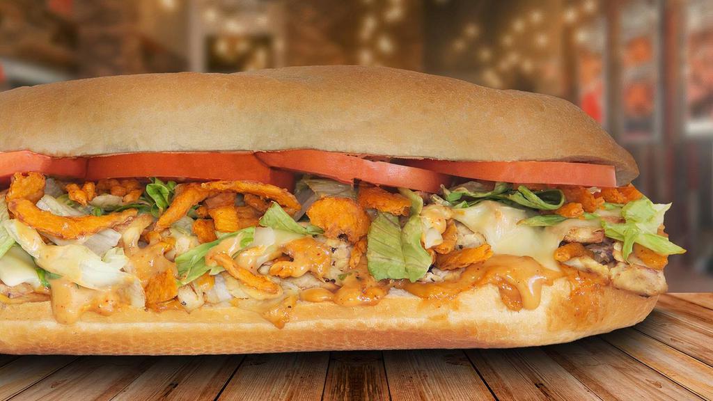 Chicken Chipotle Crunch · A cheese steak with a crunch and kick! Our Chicken Chipotle Crunch is made with premium chicken grilled with American cheese and topped with lettuce, tomato, crispy cheddar onions, and chipotle ranch dressing