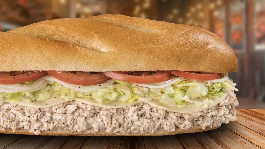 Homemade Tuna · Here's your opporTUNAty to try Cap's Classic Homemade Tuna, made fresh and served with provolone cheese, lettuce, tomato, and onions.