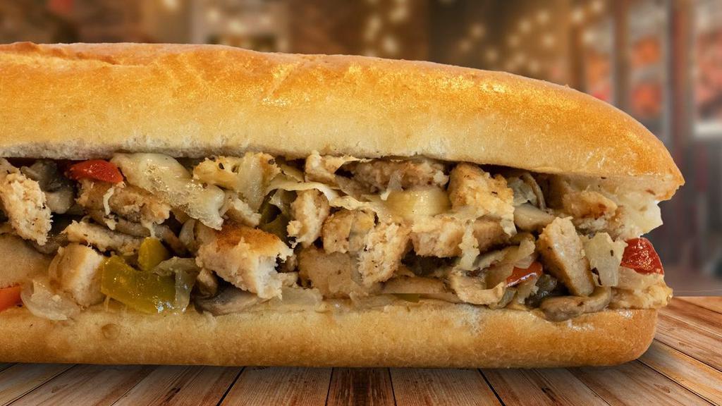 Vegetarian Chicken Cheese Steak · Vegetarian chicken is the star and its supporting cast is mushrooms, onions, Provolone cheese and your choice of hot or sweet peppers.