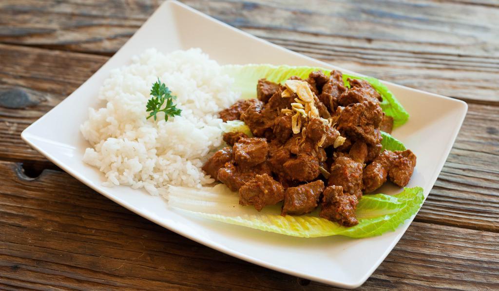 Rendang · Spicy beef stew with traditional Indonesian spices.