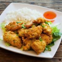Sweet & Sour Chicken · Chunks of chicken breast fried in a light batter and served on a bed of lettuce with sweet a...