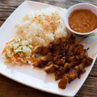 Sate Ayam Chicken Satay · Marinated chicken or pork served on bamboo skewers with our spicy peanut sauce.

Add $ 1.00 ...