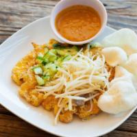 Tahu Telor · Tofu, mixed vegetables and egg fried and served with spicy peanut sauce with shrimp paste.