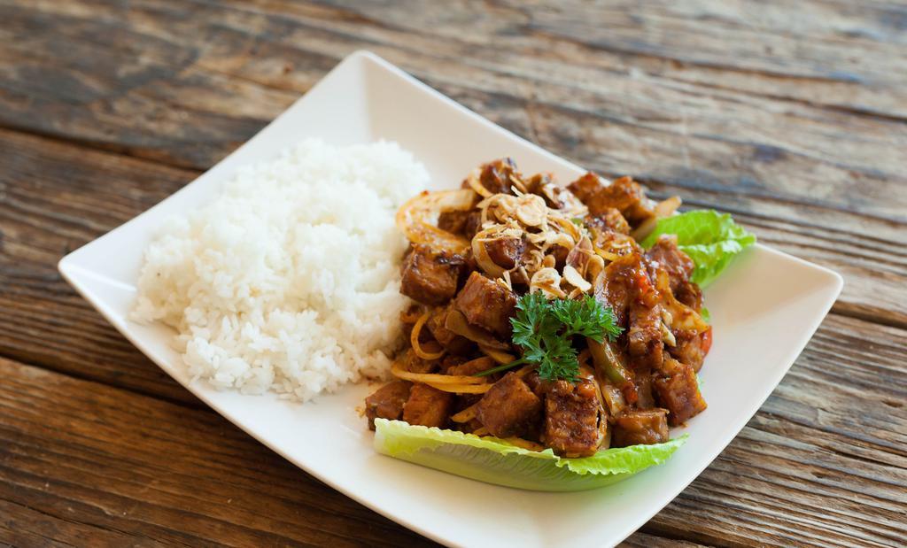 Tempeh Orek-Arik · Stir fried tempeh (cultured soy cake) with onion, red bell pepper and lemon grass herbs.