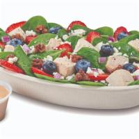 Spring Berry Salad · Baby Spinach, Chicken, Strawberry, Red Onion, Blueberry, Feta, Candied Pecan and  Mediterran...