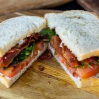 Blt Sandwich · House smoked applewood bacon, tomato, arugula with house made rosemary aioli on toasted rust...