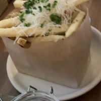 Truffle Fries · Truffle oil, parmesan, chives