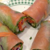 Smoke Salmon Fresh Roll · Green leaves, carrot, cucumber, mint leaves, cilantro, rice noodle wrapped in rice paper. Se...