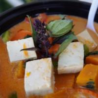 Red Curry · Coconut milk, bamboo shoot, eggplants, bell pepper, and basil. Served with jasmine white rice.