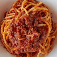 Spaghetti Bolognese · Homemade spaghetti in a beef sauce.