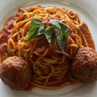 Spaghetti & Meatballs · Homemade spaghetti with tomato sauce & homemade meatballs.