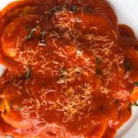 Cheese Ravioli · Cheese  ravioli in a tomato sauce