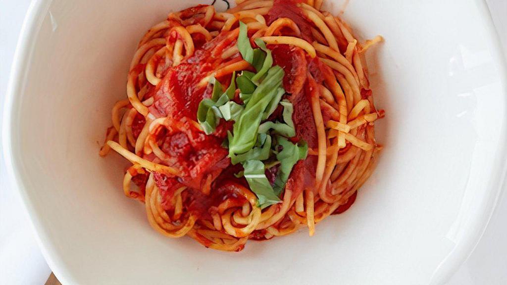 Spaghetti Pomodoro · Homemade spaghetti in a tomato basil sauce.