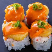(F042) Popcorn Shrimp Roll · Spicy. Four pieces. California roll. Topped with eel sauce, popcorn shrimp, spicy mayonnaise...