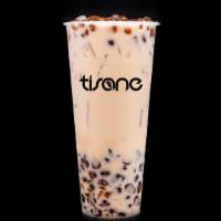 Golden · Organic English Breakfast Milk Tea infused with Golden 
Brown Sugar. Paired with Golden Brow...