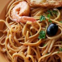 Seafood Linguine · Linguine, sauteed shrimp, and scallops tossed in roasted tomato cream sauce
