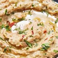 Baba Ghanoush · ( Gluten - Free)  Served Cold.  Roasted Eggplant Dip Served with Pita Bread.