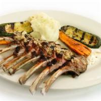 Rack Of Lamb · Spring rack of lamb mesquite grilled, basted with olive oil, rosemary and garlic. Served wit...