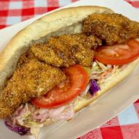 Fried Catfish Po'Boy · Fried catfish sandwich on a french roll. Comes with tomato, coleslaw, and remoulade sauce on...