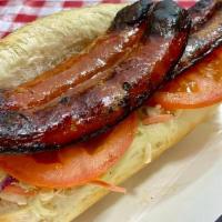 Hotlink Po'Boy · Louisiana hot link sausage sandwich on a french roll. Comes with tomato, coleslaw, and remou...