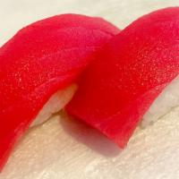 Tuna Sushi (2 Pc) · Tuna and sushi rice.