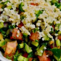 Tabouli Salad · Cucumber, tomato, parsley, cilantro, red onions, and dressing.