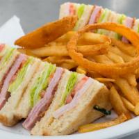 Club Sandwich Special · Bacon, Ham, Turkey, Lettuce, Tomato & Mayonnaise on 3 slices of White Bread.