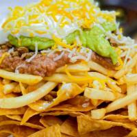 Surf & Turf Fries · Choice of Meat: Carne Asdada, Pollo Asada, Carnitas, or Adobada
French Fries Topped with Shr...